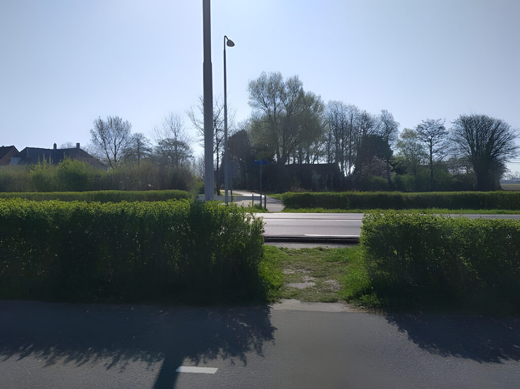 Oversteek plek door heg over weg